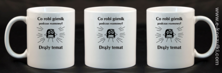 Co robi górnik podczas rozmowy drąży temat - kubek 